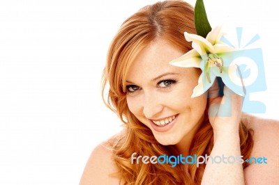 Young Beautiful Woman With Flower Stock Photo