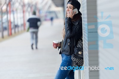 Young Beautiful Woman With Mobile Phone And Coffee Stock Photo