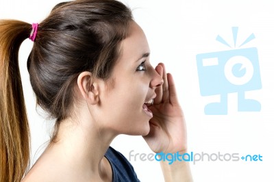 Young Blonde Woman Whispering Gossip Stock Photo