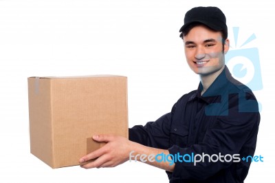 Young Boy Delivering Parcel Stock Photo