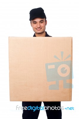 Young Boy Delivering Parcel Stock Photo