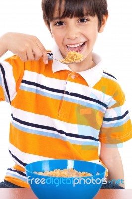 Young Boy Having His Breakfast Stock Photo