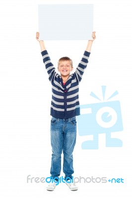 Young Boy Holding Blank Board Stock Photo