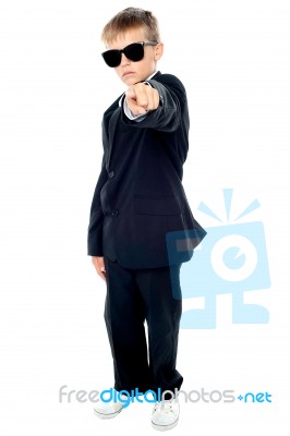 Young boy Pointing Forward Stock Photo