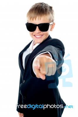 Young boy Pointing Forward Stock Photo