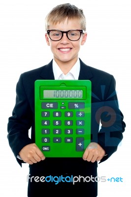 Young boy Showing Calculator Stock Photo