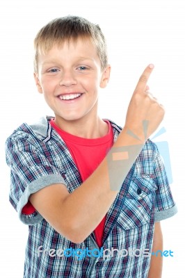 Young boy showing pointing up Stock Photo