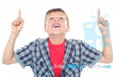 Young Boy Showing Pointing Upwards Stock Photo