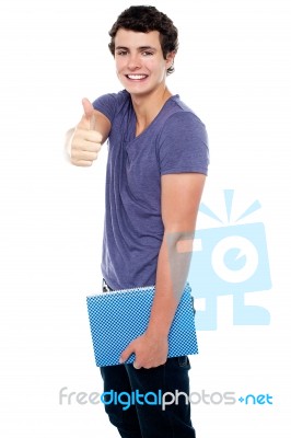 Young Boy Showing Thumbs Up Stock Photo