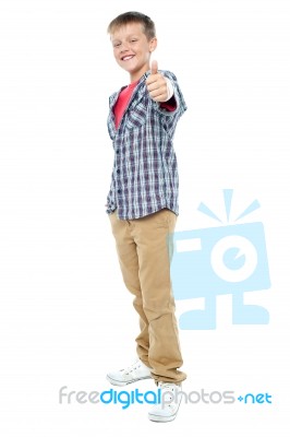 Young Boy Showing Thumbs Up Stock Photo