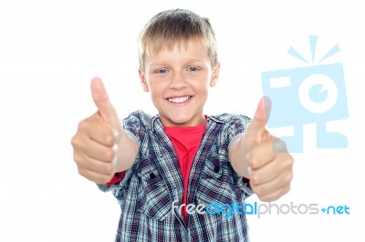 Young Boy Showing Thumbs Up Stock Photo