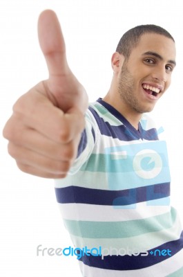 Young Boy Showing Thumbs Up Stock Photo