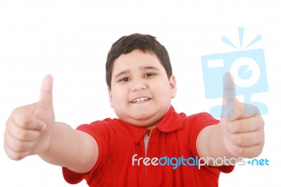 Young Boy Showing Thumbs Up Stock Photo