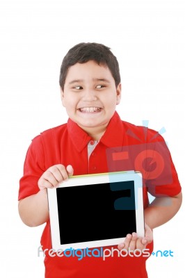 Young Boy With Digital Tablet Stock Photo