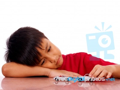 Young Boy With His Cars Stock Photo