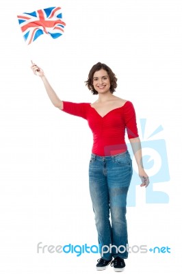 Young British Supporter Waving National Flag Stock Photo