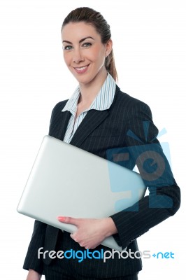 Young Business Executive With Laptop Stock Photo