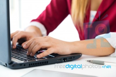 Young Business Girl Using Her Computer Stock Photo