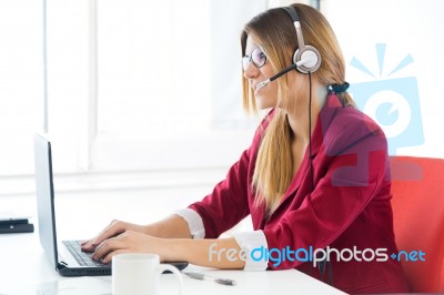 Young Business Girl Using Her Computer Stock Photo