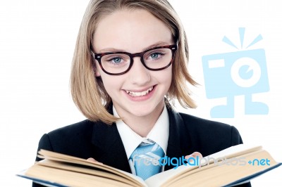 Young Business Leader Reading A Book Stock Photo