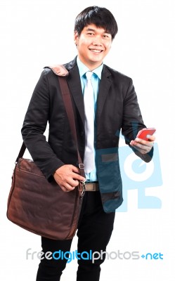 Young Business Man And Computer Laptop Suit Bag And Handle Paper Working Plan Wearing Western Suit Standing And Smiling To Camera Isolated White Background Stock Photo