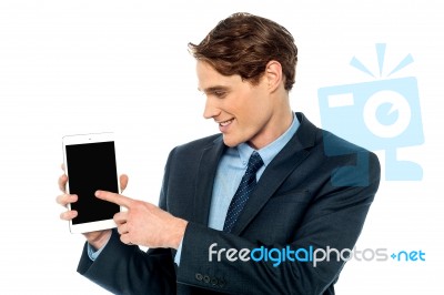 Young Business Man Displaying His New Tablet Stock Photo