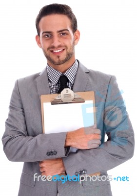 Young Business Man Holding A Clip Board Stock Photo