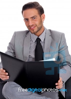 Young Business Man Holding A Clipboard Stock Photo