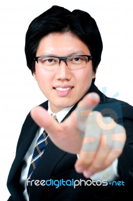 Young Business Man Pointing At Stock Photo