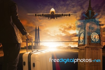 Young Business Man Standing With Luggage On Urban Airport Runway… Stock Photo