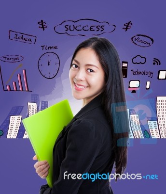 Young Business Woman Has Many Ideas On Business Background Stock Photo