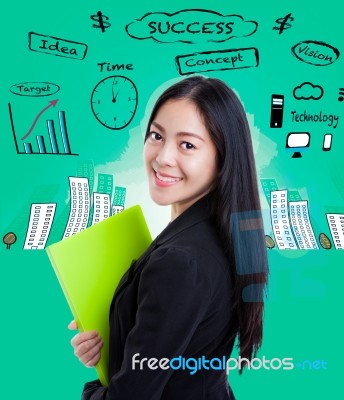 Young Business Woman Has Many Ideas On Business Background Stock Photo