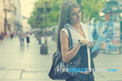 Young Business Woman With Tablet Computer Walking On Urban Stree… Stock Photo