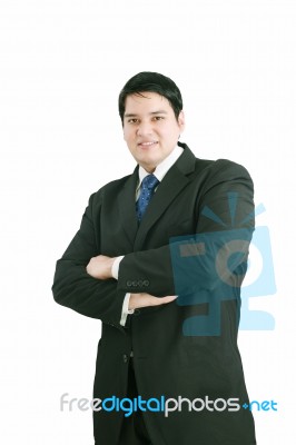 Young Businessman Folded Arm Stock Photo