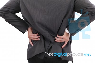 Young Businessman Having Some Lower Back Pain Stock Photo