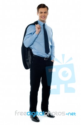 Young Businessman Holding Jacket Stock Photo