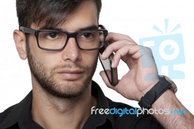 Young Businessman On The Phone Stock Photo