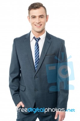 Young Businessman Posing Stylishly Stock Photo