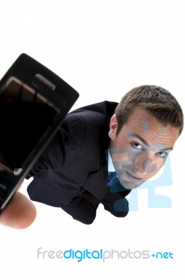 Young Businessman Showing His Mobile Stock Photo