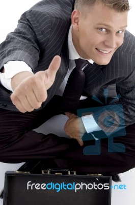 Young Businessman showing Thumb Up Stock Photo