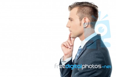 Young Businessman Thinking Stock Photo