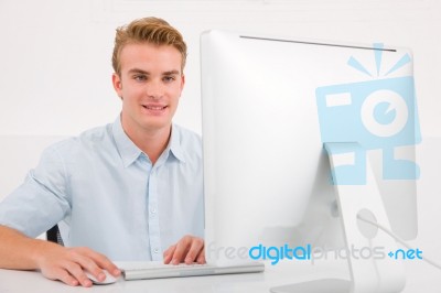 Young Businessman Using Computer Stock Photo