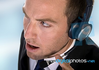 Young Businessman With Headphones Stock Photo