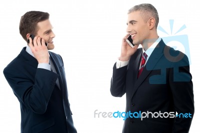 Young Businessmen With Cell Phones Stock Photo