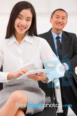 Young Businesswoman Holding Digital Tablet Stock Photo