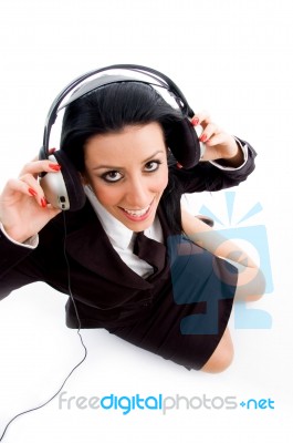 Young Businesswoman Holding Headphone Stock Photo