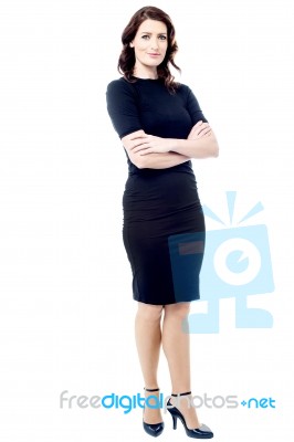 Young Businesswoman With Crossed Arms Stock Photo