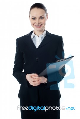 Young Businesswoman With Folder Stock Photo