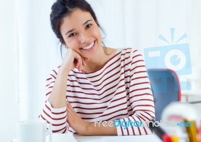 Young Businesswomen Working In Her Office Stock Photo