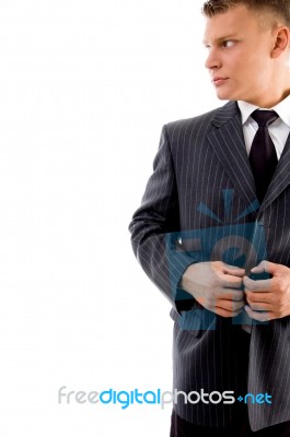 Young Ceo Tucking His Coat Button Stock Photo